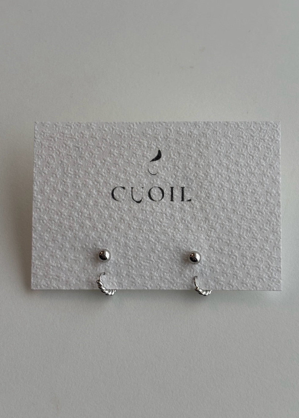 dot hoop pierce
