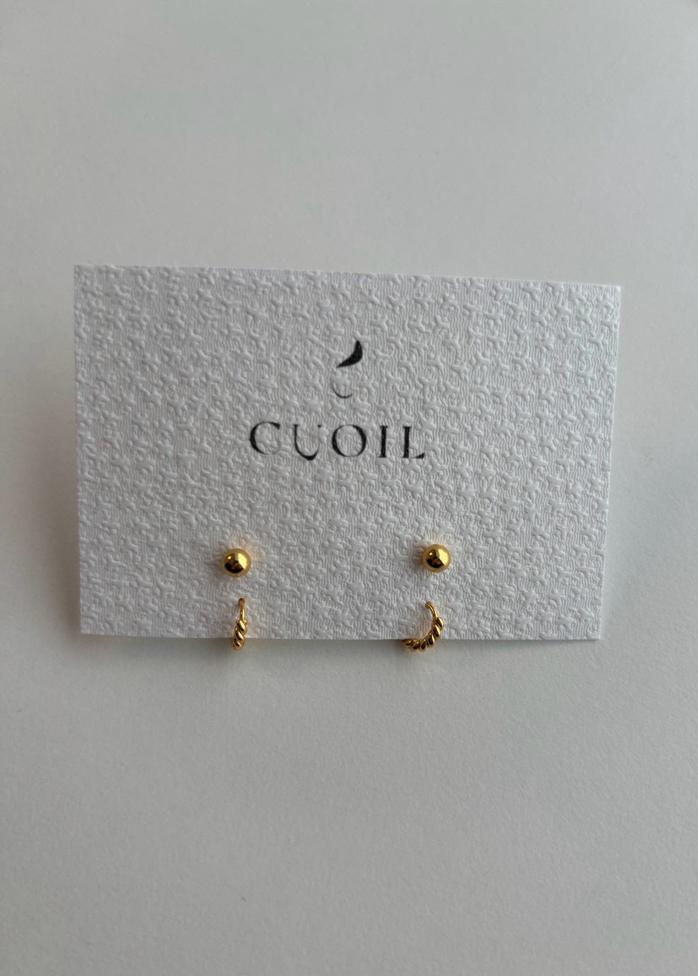 dot hoop pierce